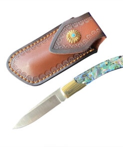 A sharp pocket knife displayed next to a leather knife pouch.