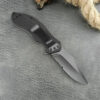 A small pocket knife with clip.