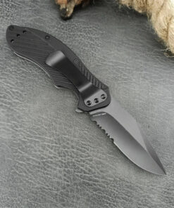 A small pocket knife with clip.