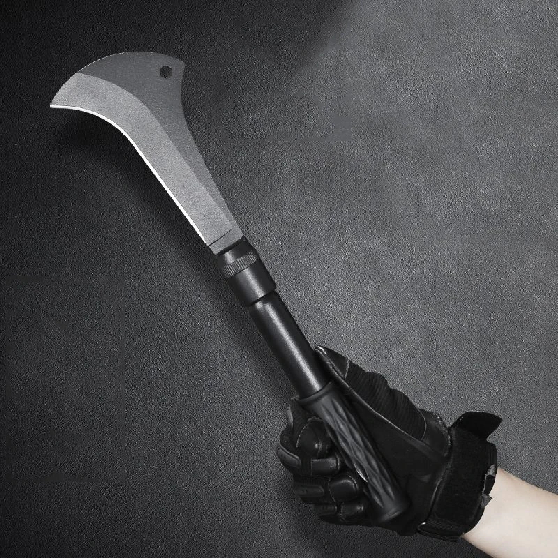 Bill Hook Machete A man's hand holding a survival bill hook machete.