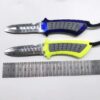 Two diver's knife models of differing colors displayed next to a steel ruler.