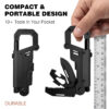 A man's hand holding a multitool keychain next to a steel ruler.