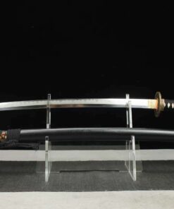 A black dragon Katana sword, displayed on a small stand alongside its scabbard.