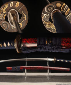A dragon Katana Samurai sword, displayed on a small stand, alongside its scabbard.