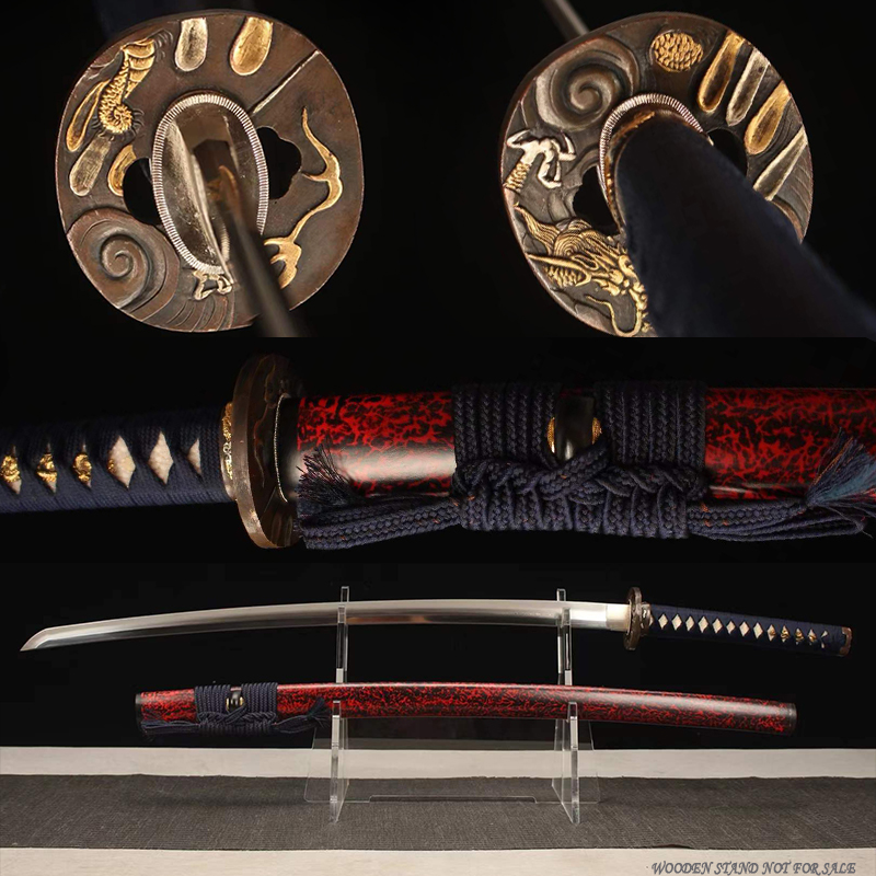 Dragon Katana Samurai Sword A dragon Katana Samurai sword, displayed on a small stand, alongside its scabbard.