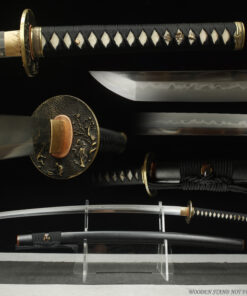 A 1095 steel battle ready Katana, displayed on a small stand, alongside its black scabbard.
