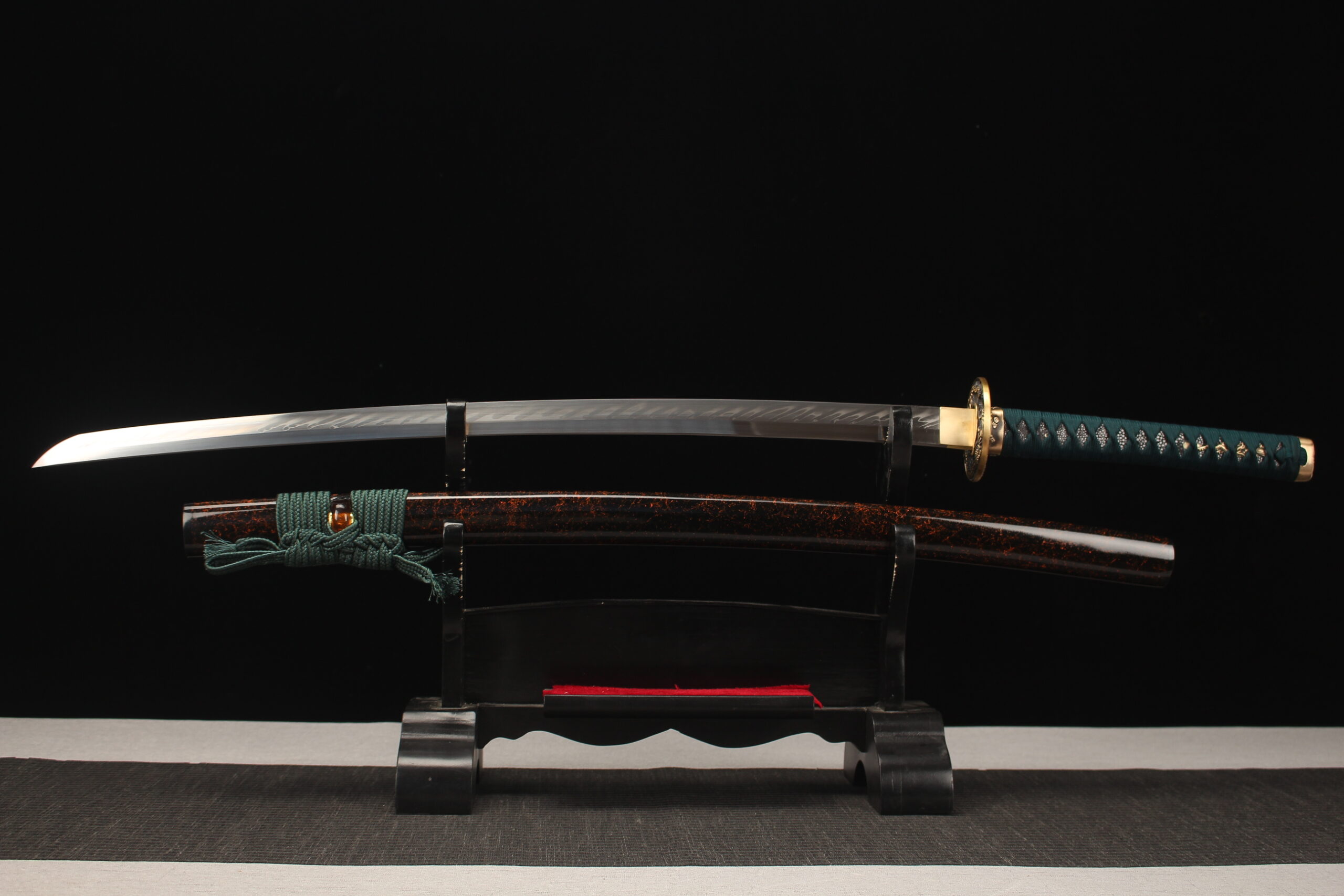 True Dragon Sword A true dragon sword Katana, displayed on a wooden stand alongside its scabbard.